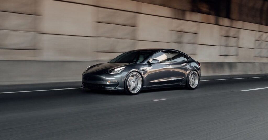 Tesla FSD Renamed “Tesla Assisted Driving” in Europe: What Changed Tesla car driving on road