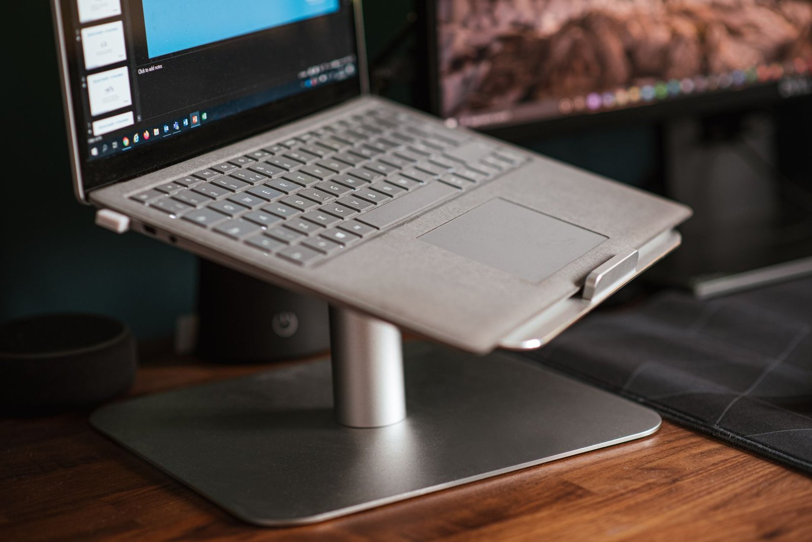 Laptop on a stand for better airflow